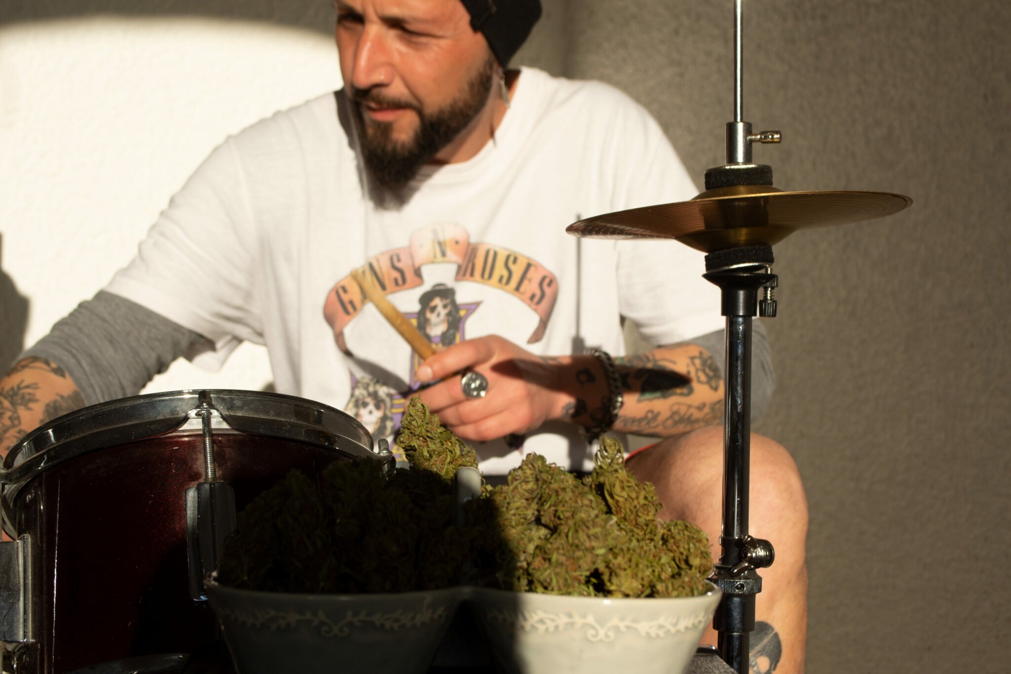 Leo plays drums - Kamapua'a Marijuana Light Shop